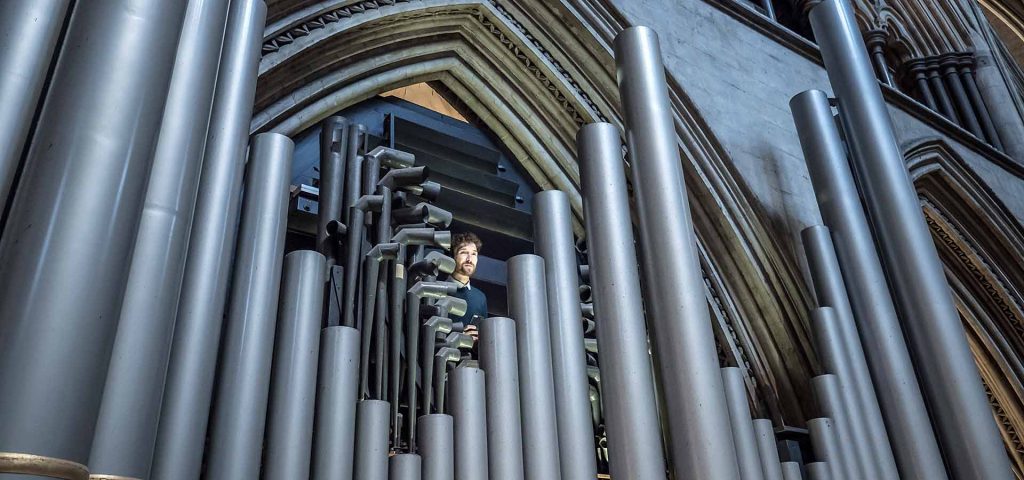 Behind the Pipes. Photo by Ash Mills